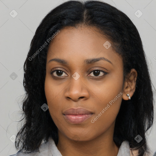 Joyful latino young-adult female with long  black hair and brown eyes