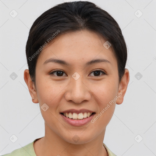 Joyful asian young-adult female with short  brown hair and brown eyes