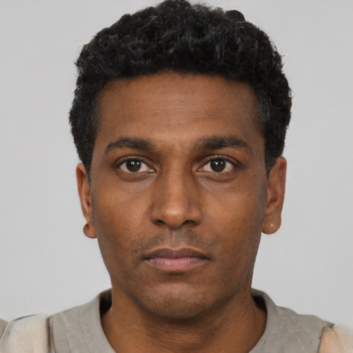 Neutral black young-adult male with short  black hair and brown eyes