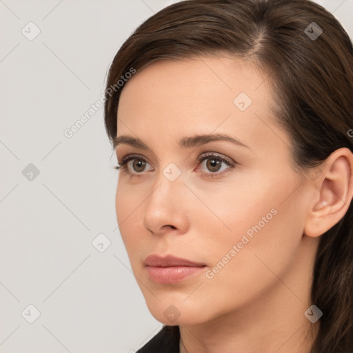 Neutral white young-adult female with short  brown hair and brown eyes