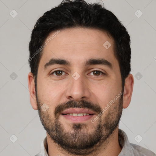 Joyful white young-adult male with short  black hair and brown eyes