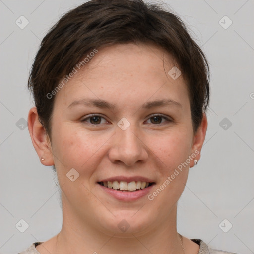 Joyful white young-adult female with short  brown hair and grey eyes