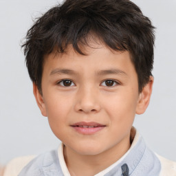 Joyful white child male with short  brown hair and brown eyes