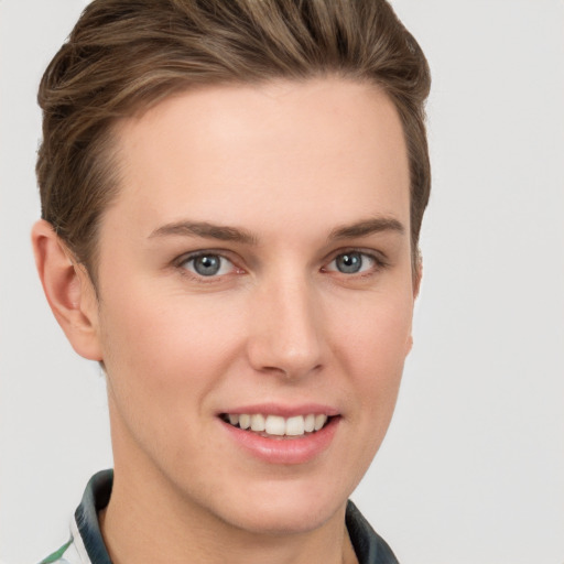 Joyful white young-adult female with short  brown hair and grey eyes