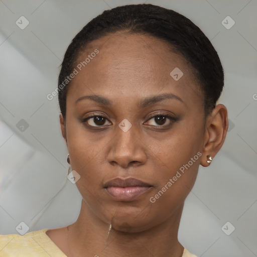 Neutral black young-adult female with short  brown hair and brown eyes