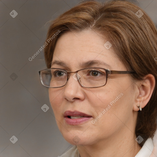 Joyful white adult female with medium  brown hair and brown eyes