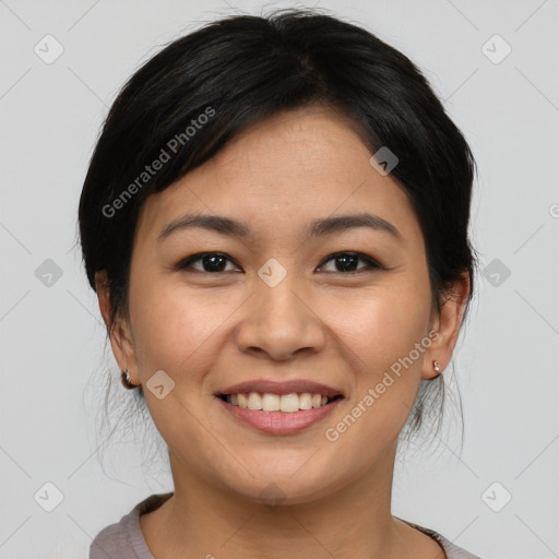 Joyful asian young-adult female with medium  brown hair and brown eyes