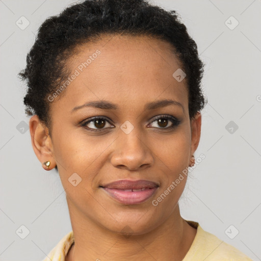 Joyful black young-adult female with short  brown hair and brown eyes