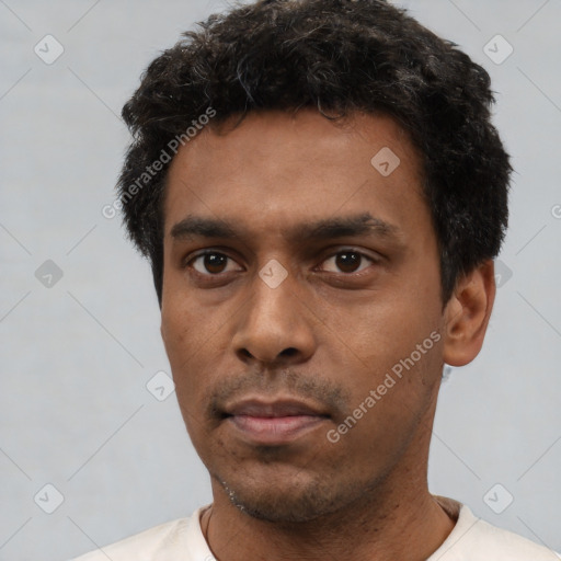 Neutral white young-adult male with short  black hair and brown eyes