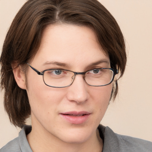 Neutral white young-adult female with medium  brown hair and brown eyes