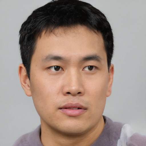 Neutral asian young-adult male with short  black hair and brown eyes
