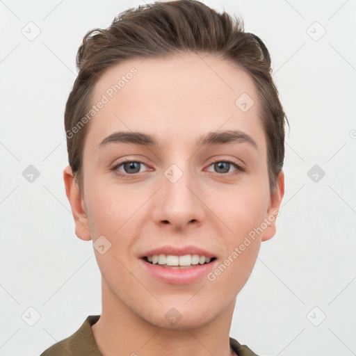 Joyful white young-adult female with short  brown hair and grey eyes