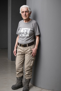 Syrian elderly non-binary with  gray hair