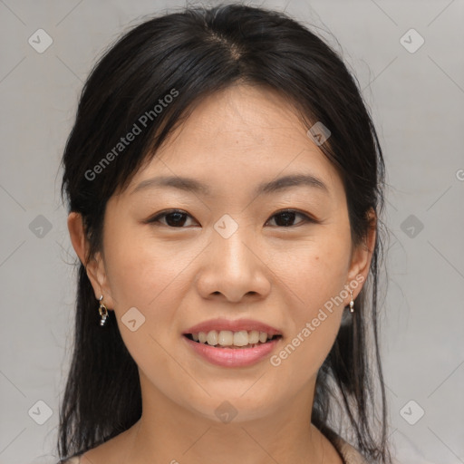 Joyful asian young-adult female with medium  brown hair and brown eyes