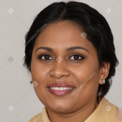 Joyful black young-adult female with medium  brown hair and brown eyes