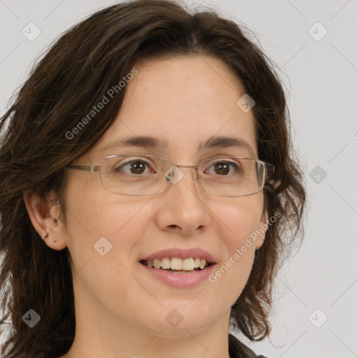 Joyful white adult female with medium  brown hair and green eyes