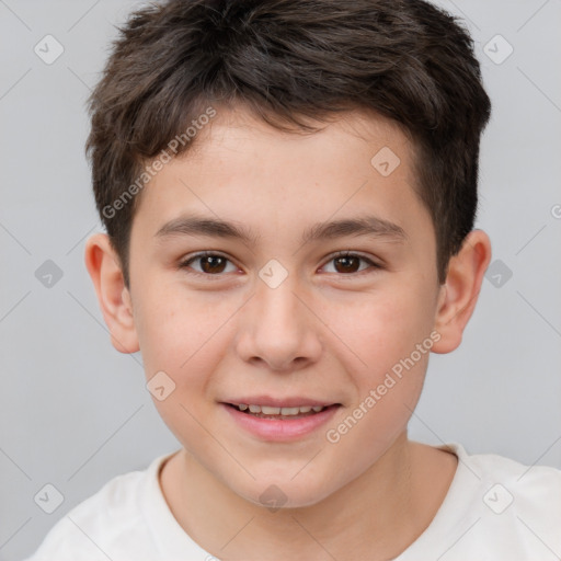 Joyful white child male with short  brown hair and brown eyes