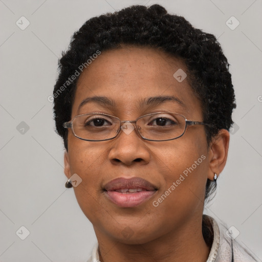 Joyful latino adult female with short  brown hair and brown eyes