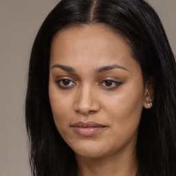 Joyful asian young-adult female with long  brown hair and brown eyes