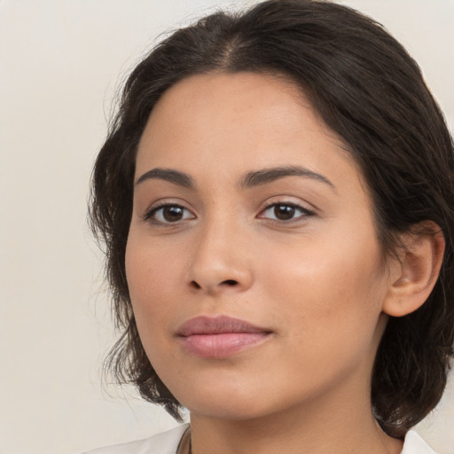 Neutral white young-adult female with medium  brown hair and brown eyes