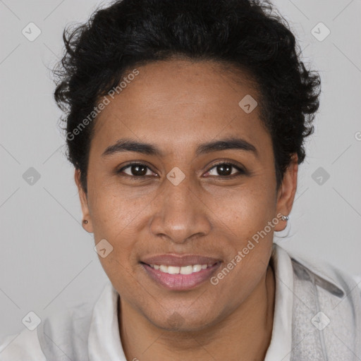 Joyful black young-adult female with short  brown hair and brown eyes