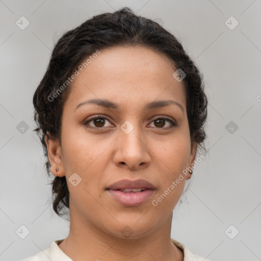 Joyful latino young-adult female with medium  brown hair and brown eyes