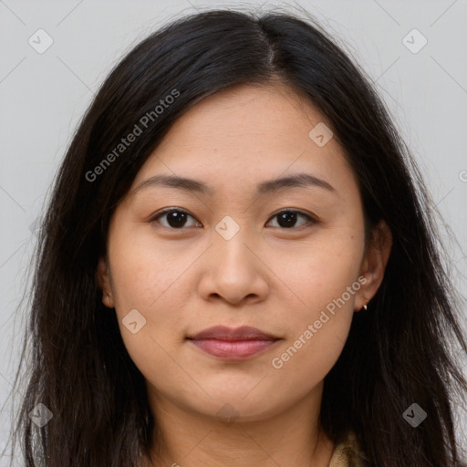 Joyful latino young-adult female with long  brown hair and brown eyes