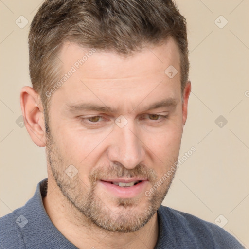 Joyful white adult male with short  brown hair and grey eyes