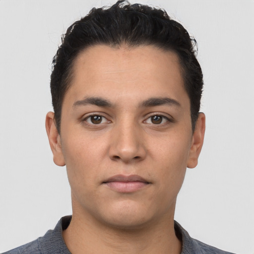 Neutral white young-adult male with short  black hair and brown eyes