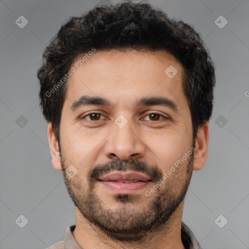 Joyful white young-adult male with short  black hair and brown eyes