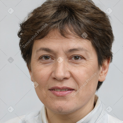 Joyful white adult female with short  brown hair and brown eyes