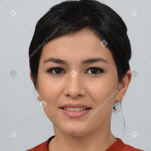 Joyful asian young-adult female with short  brown hair and brown eyes