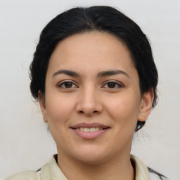 Joyful asian young-adult female with medium  brown hair and brown eyes