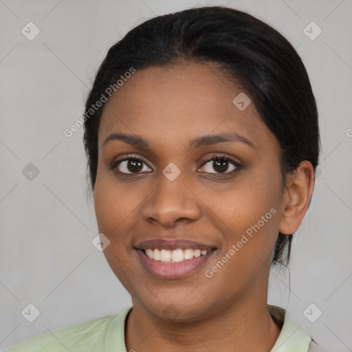 Joyful latino young-adult female with medium  black hair and brown eyes