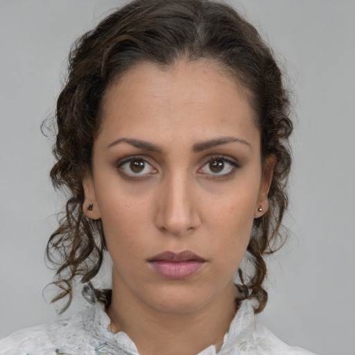 Neutral white young-adult female with medium  brown hair and brown eyes