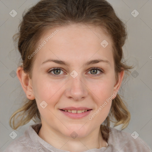 Joyful white young-adult female with medium  brown hair and blue eyes