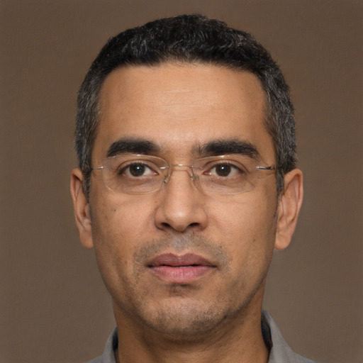 Neutral white adult male with short  black hair and brown eyes