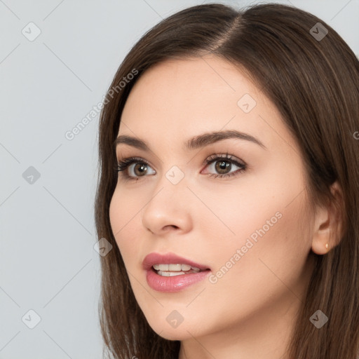 Neutral white young-adult female with long  brown hair and brown eyes