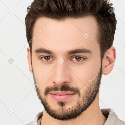 Neutral white young-adult male with short  brown hair and brown eyes