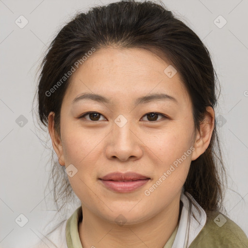 Joyful asian young-adult female with medium  brown hair and brown eyes