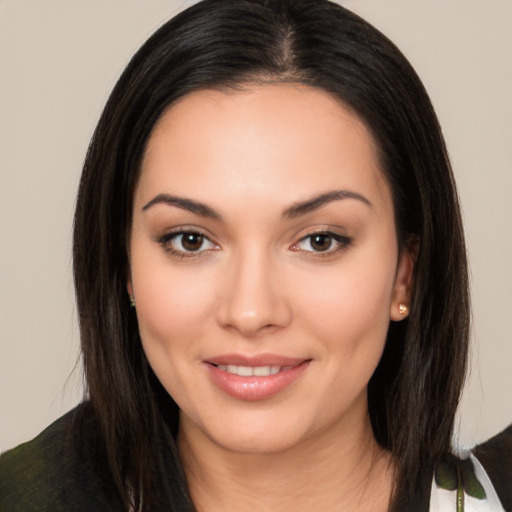 Joyful white young-adult female with long  black hair and brown eyes