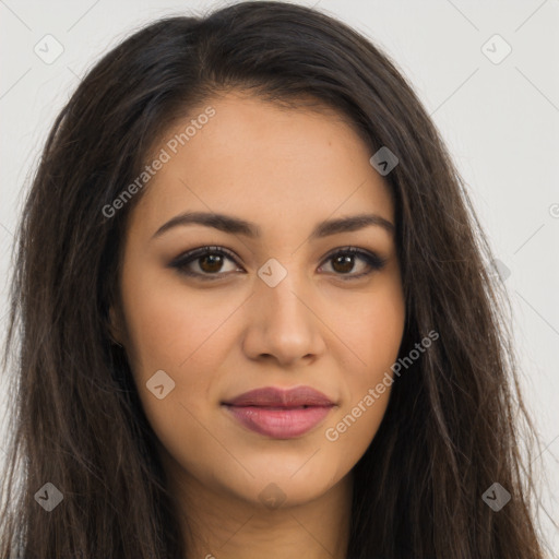 Joyful latino young-adult female with long  brown hair and brown eyes