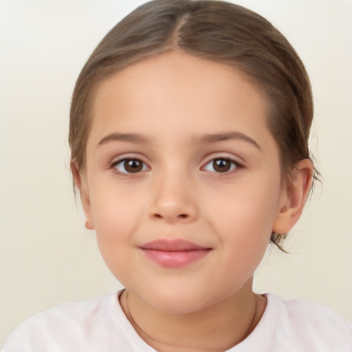 Joyful white child female with short  brown hair and brown eyes