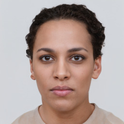 Neutral white young-adult female with short  brown hair and brown eyes