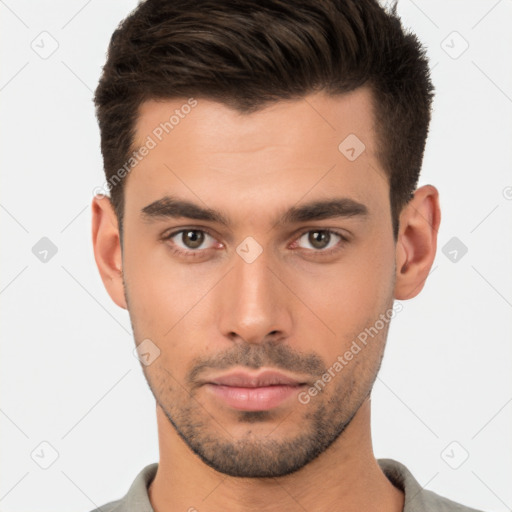 Neutral white young-adult male with short  brown hair and brown eyes