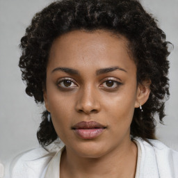 Neutral black young-adult female with short  brown hair and brown eyes