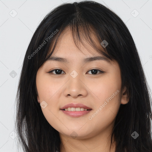 Joyful asian young-adult female with long  brown hair and brown eyes