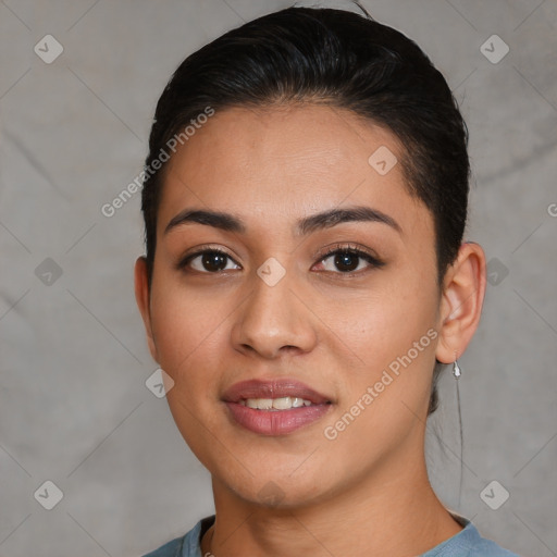 Joyful white young-adult female with short  black hair and brown eyes