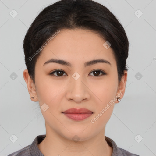 Joyful asian young-adult female with short  brown hair and brown eyes