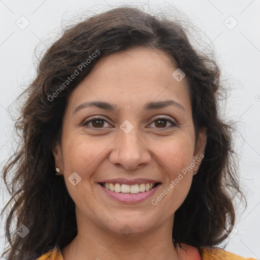 Joyful white adult female with long  brown hair and brown eyes